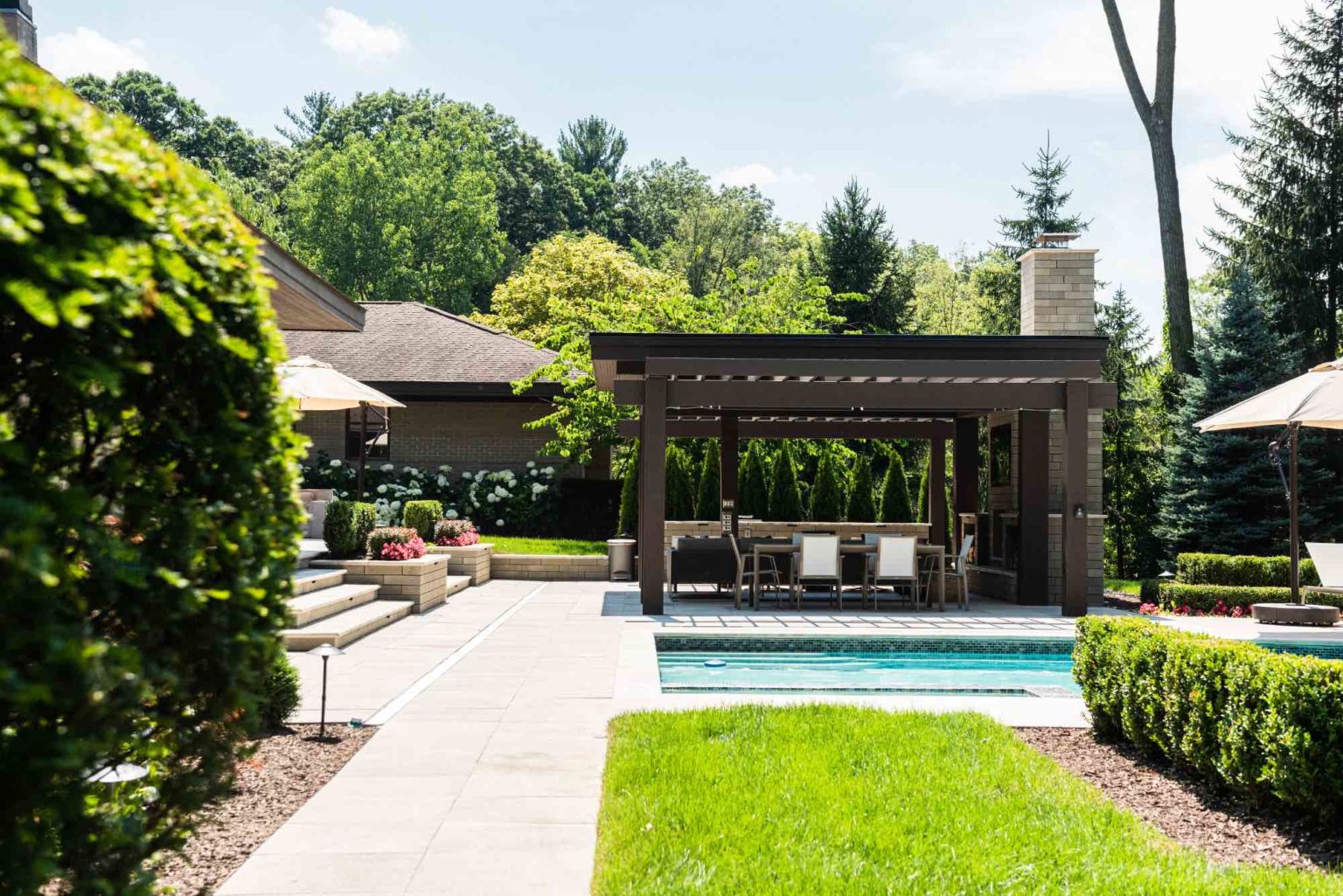 Poolside Pergola Franklin, MI Metro Detroit pool and spa experts Custom pool design Metro Detroit Spa installation in Metro Detroit Metro Detroit outdoor spa design Residential pool design Metro Detroit Commercial spa design Metro Detroit Metro Detroit luxury pool and spa Pool and spa renovation Metro Detroit Metro Detroit backyard pool design Metro Detroit pool and spa builders Metro Detroit pool and spa contractors Affordable pool and spa design Metro Detroit shade structures in Michigan Michigan shade solutions Outdoor shade Michigan Shade canopy Michigan Detroit shade structures Grand Rapids outdoor shading Ann Arbor shade canopies Lansing shade sail installation Michigan Pavers Paver Installation Michigan Paver Contractors in Michigan Best Pavers in Michigan Michigan Patio Pavers Driveway Pavers Michigan Walkway Pavers Michigan Michigan Paver Stones Custom Pavers Michigan Michigan Paver Design custom cedar pergola