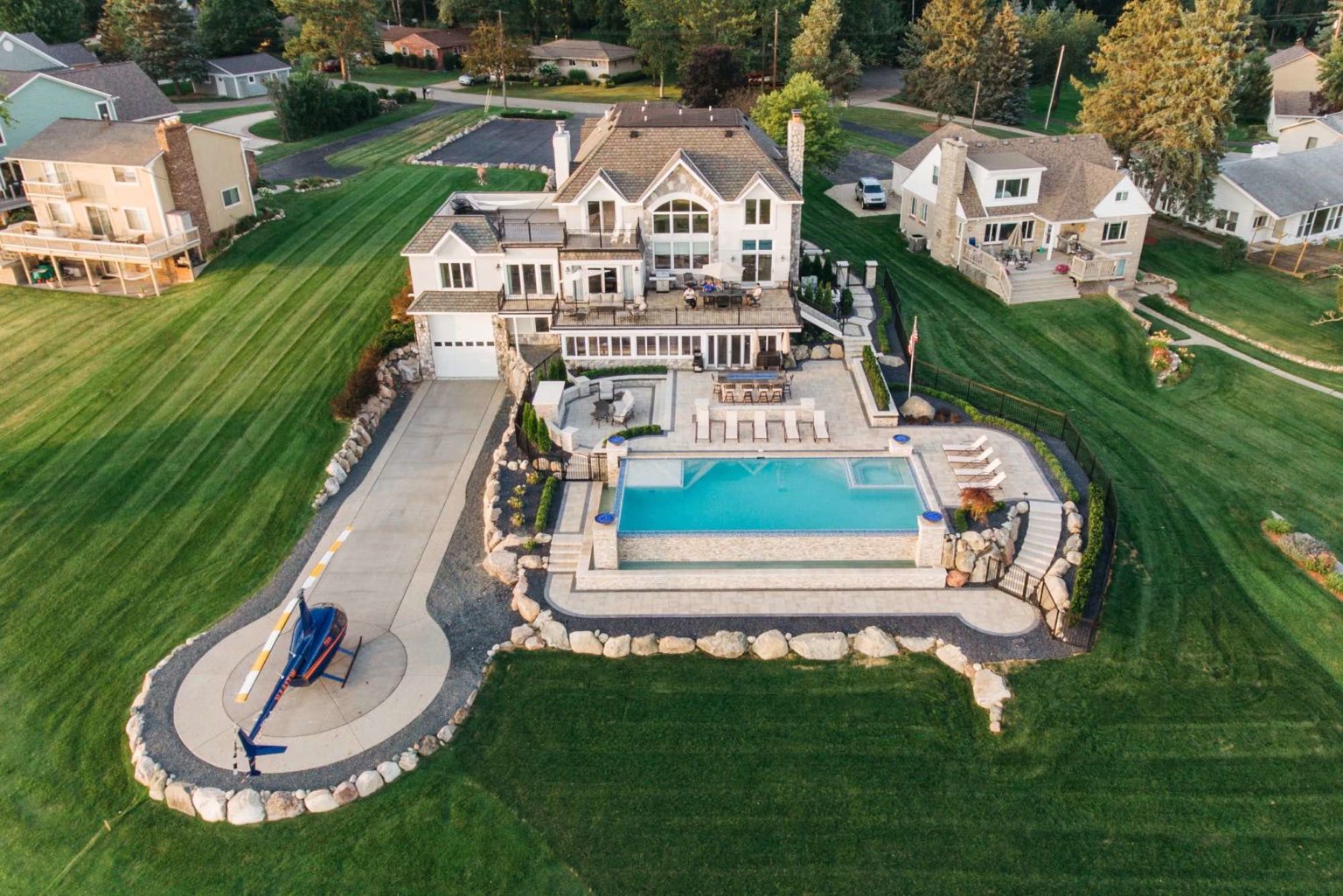 Patio designs detroit mi Patio company Outdoor living contractor oak Backyard pool ideas detroit Landscape lighting Oakland twp mi The Helipool- antonelli