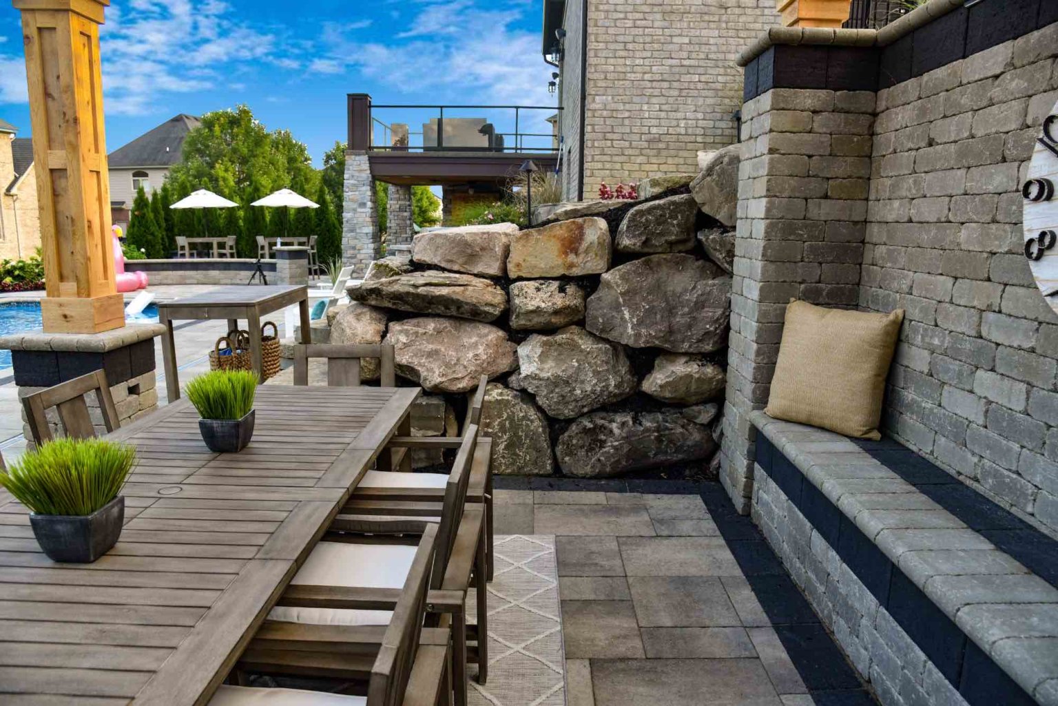 Michigan boulder retaining wall  Natural privacy 