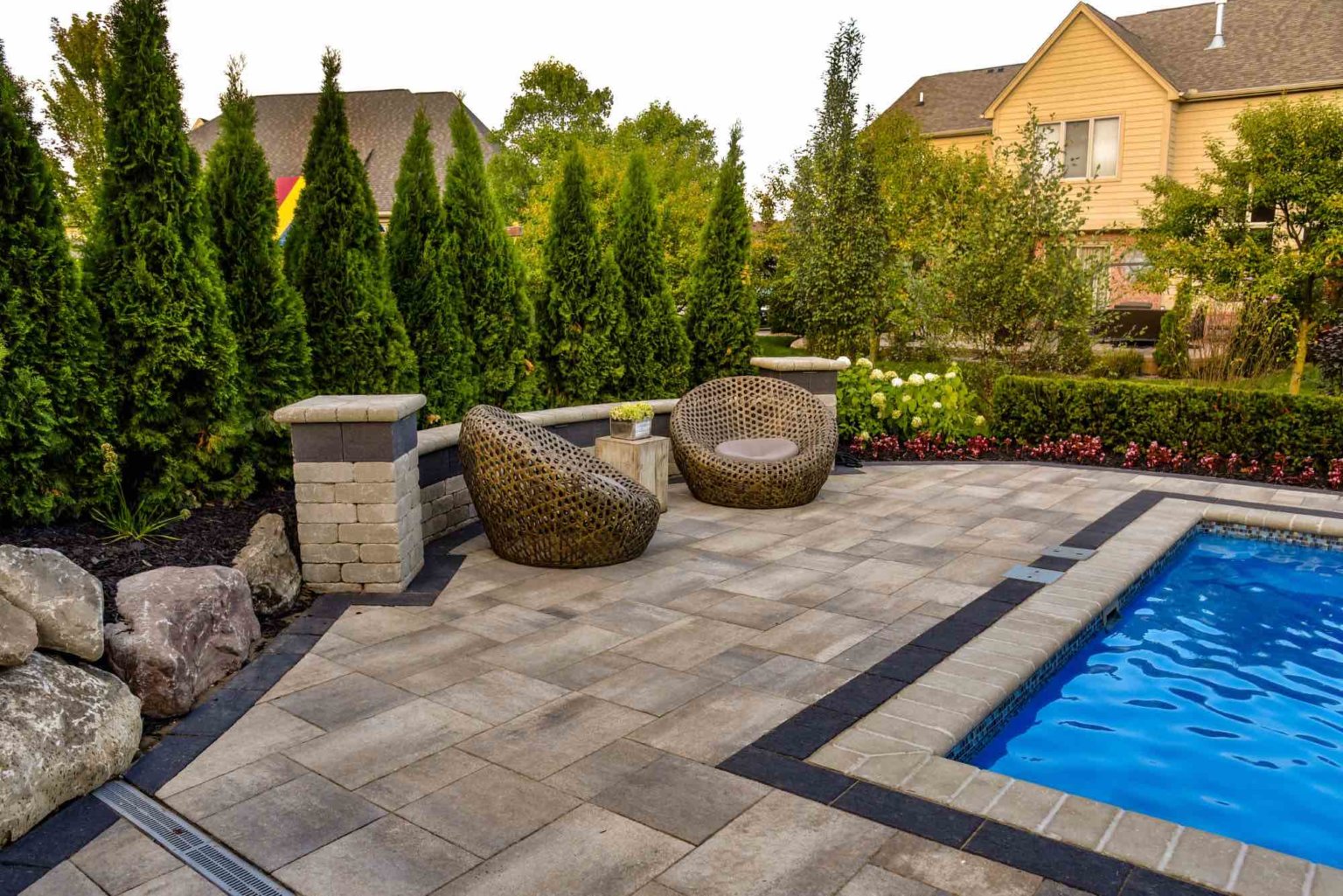 Arborvitae privacy trees  Michigan Landscape Design Landscape Design Services in Michigan Professional Landscape Design Michigan Michigan Landscape Architects Best Landscape Designers in Michigan Michigan Pavers Paver Installation Michigan Paver Contractors in Michigan Best Pavers in Michigan Michigan Patio Pavers Driveway Pavers Michigan Walkway Pavers Michigan Michigan Paver Stones Custom Pavers Michigan