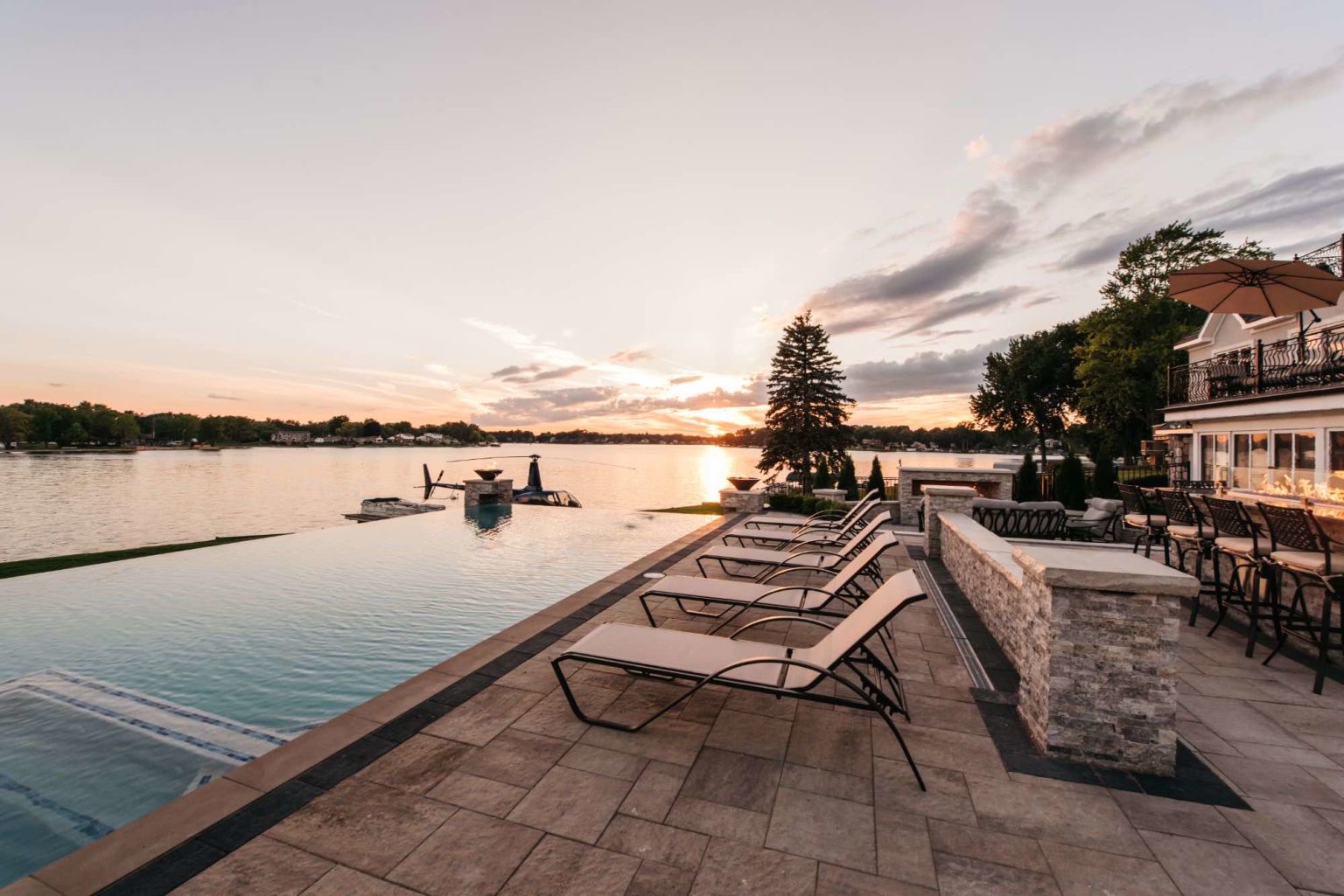 Gunite Pool Construction Custom Gunite Pool Designs Gunite Pool Installation Gunite Pool vs. Vinyl Pool Gunite Pool Benefits Gunite Pool Cost infinity edge pool builders in waterford mi