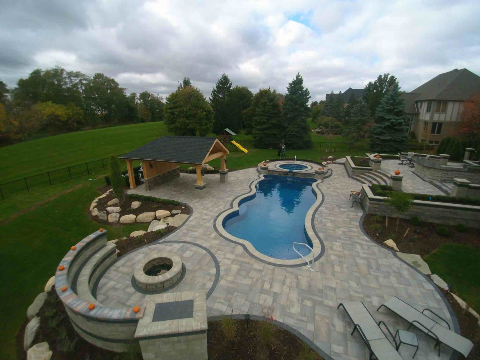 Outdoor Fire Features Fire Pit Designs Fire Feature Ideas Gas Fire Pits Outdoor Fireplaces Fire Pit Installation outdoor pavilion patio pavilion pavilion designers mi Michigan Pavers Paver Installation Michigan Paver Contractors in Michigan Best Pavers in Michigan Michigan Patio Pavers Driveway Pavers Michigan Walkway Pavers Michigan Michigan Paver Stones Custom Pavers Michigan Michigan Paver Design pool and spa design Metro Detroit Metro Detroit pool and spa experts Custom pool design Metro Detroit Spa installation in Metro Detroit Metro Detroit outdoor spa design Residential pool design Metro Detroit Metro Detroit luxury pool and spa Pool and spa renovation Metro Detroit Metro Detroit backyard pool design Metro Detroit pool and spa builders Metro Detroit pool and spa contractors