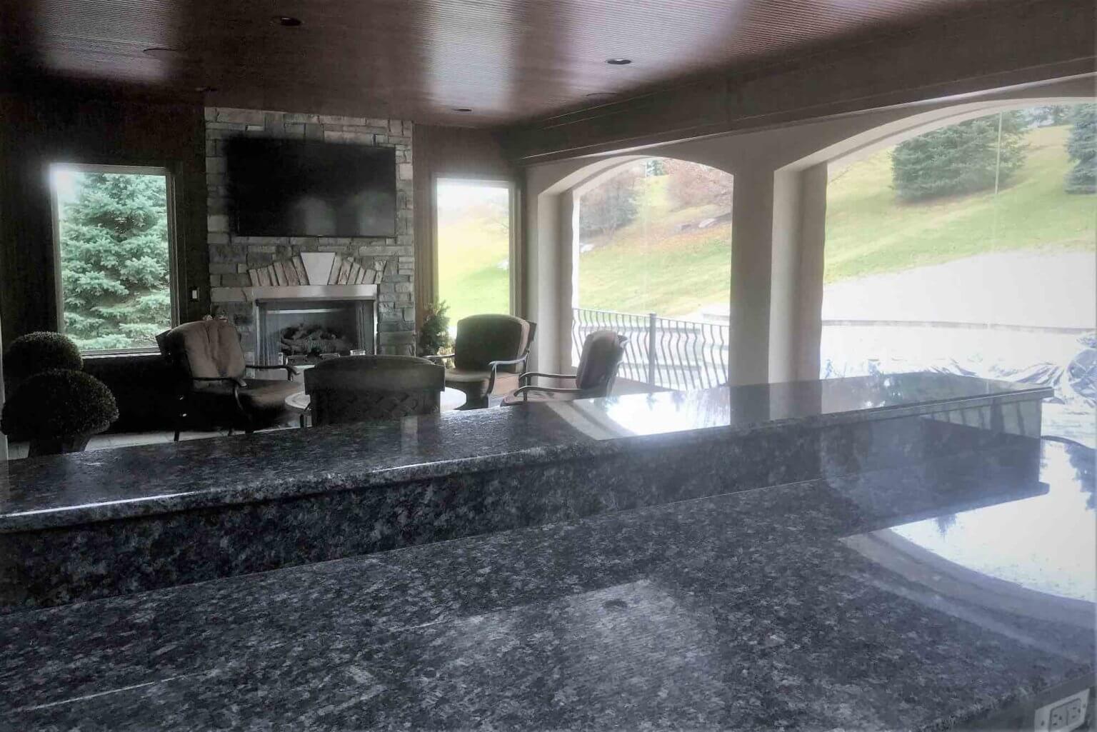 kitchen bar looking out over pool & spa Michigan Landscape Design Landscape Design Services in Michigan Professional Landscape Design Michigan Michigan Landscape Architects Best Landscape Designers in Michigan Michigan Residential Landscape Design Custom Landscape Design Michigan Michigan Garden Design Landscape Planning Michigan Landscape Installation Michigan Michigan Landscape Renovation Sustainable Landscape Design Michigan Michigan Landscaping Ideas Michigan Hardscape Design Award-Winning Landscape Design Michigan Michigan Four-Season Landscape Design Antonelli Landscape pool spa, pavers near me,