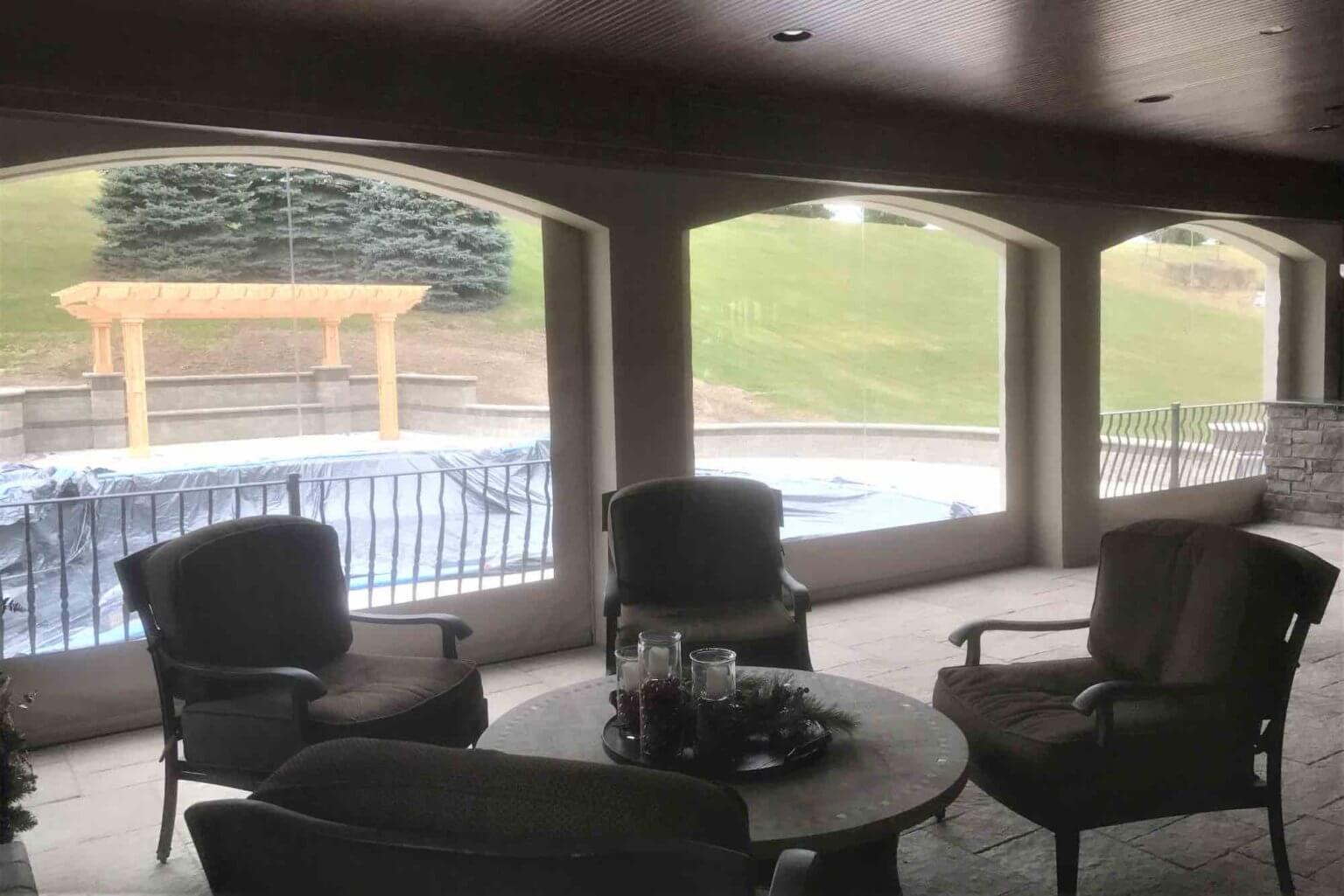 outdoor fireplace and patio next to pool Michigan Landscape Design Landscape Design Services in Michigan Professional Landscape Design Michigan Michigan Landscape Architects Best Landscape Designers in Michigan Michigan Residential Landscape Design Custom Landscape Design Michigan Michigan Garden Design Landscape Planning Michigan Landscape Installation Michigan Michigan Landscape Renovation Sustainable Landscape Design Michigan Michigan Landscaping Ideas Michigan Hardscape Design Award-Winning Landscape Design Michigan Michigan Four-Season Landscape Design