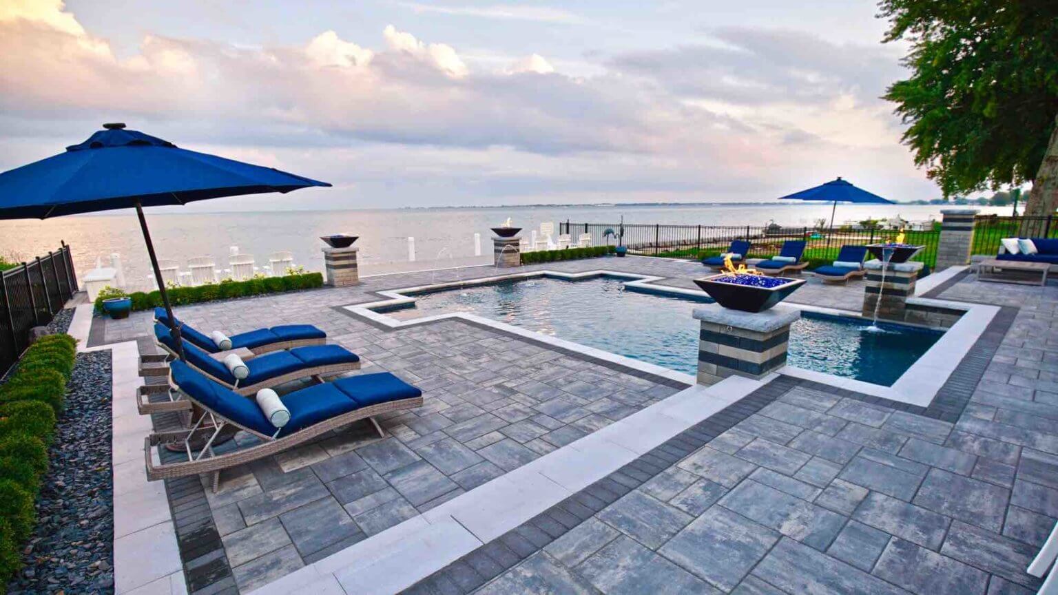 lakeside pool with fire pillars & lakefront patio Michigan Landscape Design Landscape Design Services in Michigan Professional Landscape Design Michigan Michigan Landscape Architects Best Landscape Designers in Michigan Michigan Residential Landscape Design Custom Landscape Design Michigan Michigan Garden Design Landscape Planning Michigan Landscape Installation Michigan pool and spa design Metro Detroit Metro Detroit pool and spa experts Custom pool design Metro Detroit Spa installation in Metro Detroit Metro Detroit outdoor spa design Residential pool design Metro Detroit Metro Detroit luxury pool and spa Pool and spa renovation Metro Detroit Metro Detroit backyard pool design Metro Detroit pool and spa builders Metro Detroit pool and spa contractors
