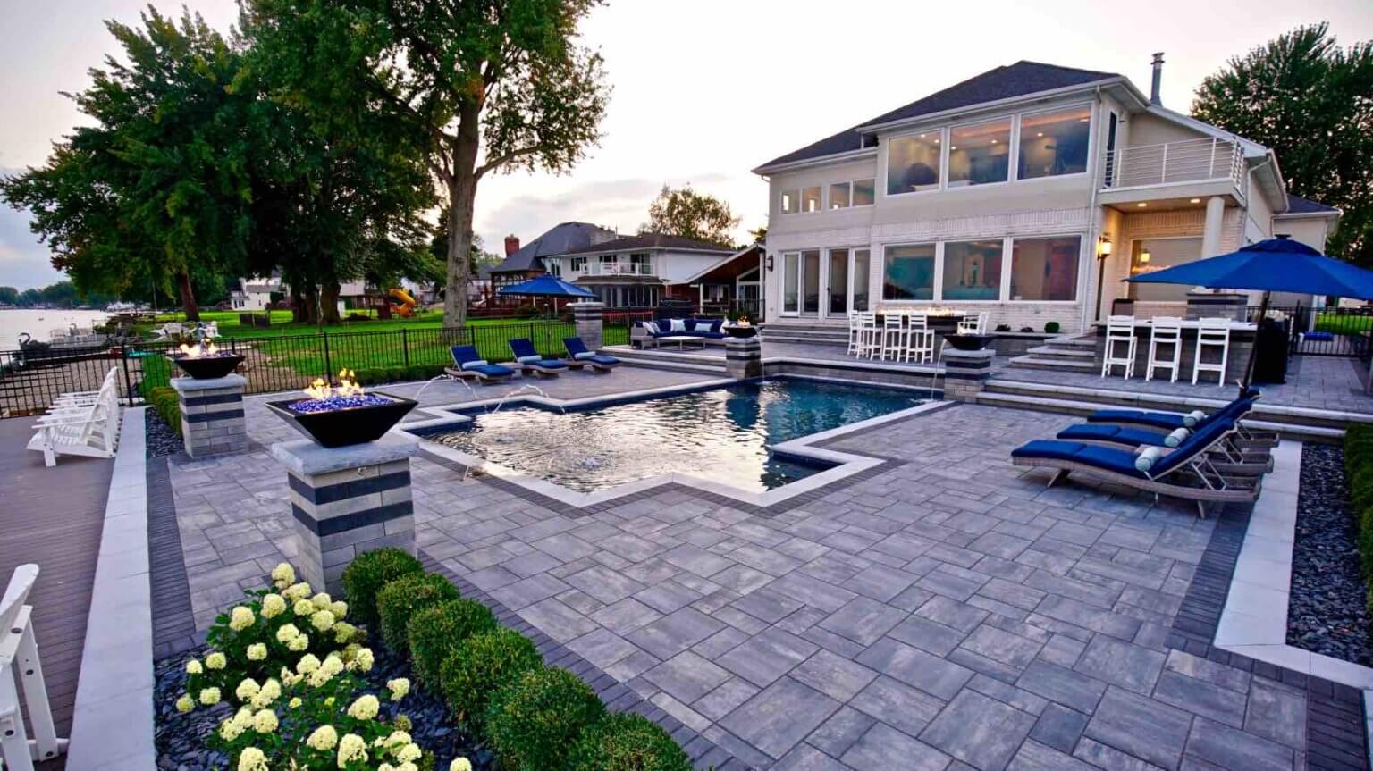 lakeside pool and seating gunite inground pool builders in Chesterfield Township Michigan Michigan Hardscape Design Award-Winning Landscape Design Michigan Michigan Four-Season Landscape Design pool and spa design Metro Detroit Metro Detroit pool and spa experts Custom pool design Metro Detroit Spa installation in Metro Detroit Metro Detroit outdoor spa design Residential pool design Metro Detroit Metro Detroit luxury pool and spa Pool and spa renovation Metro Detroit Metro Detroit backyard pool design Metro Detroit pool and spa builders Metro Detroit pool and spa contractors