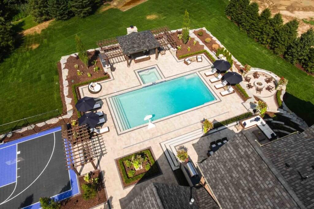 custom pools, michigan pool, backyard ideas, landscaping, paving company