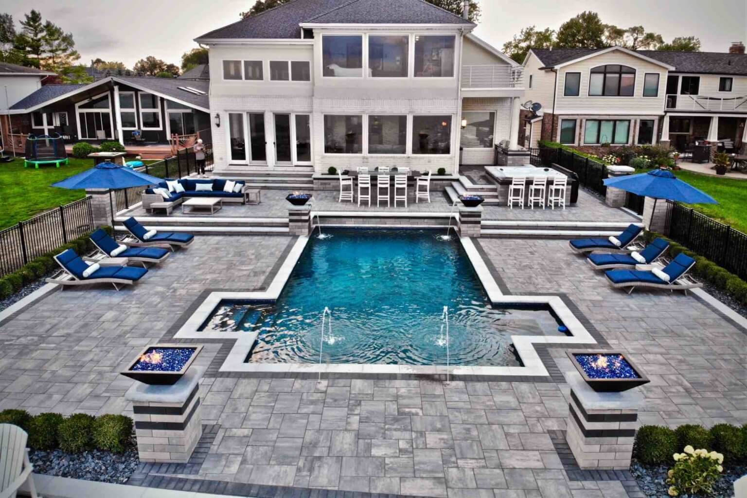 lakeside pool and patio taken from above Michigan Hardscape Design Award-Winning Landscape Design Michigan Michigan Four-Season Landscape Design