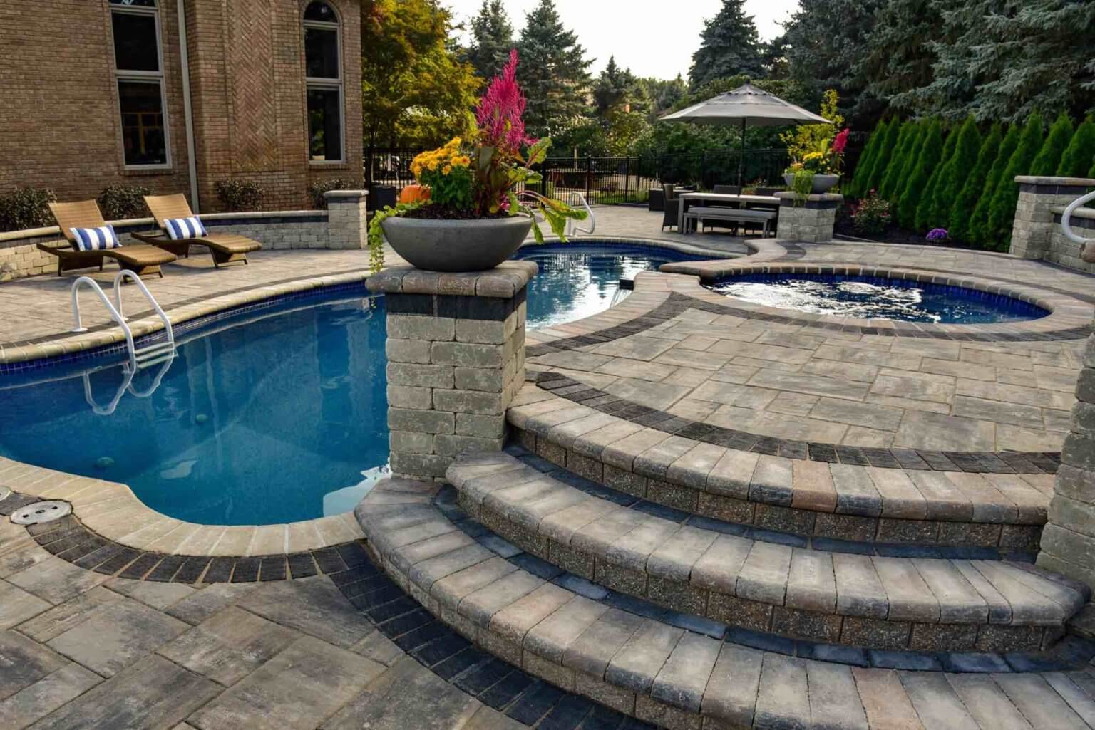 hot tub next to pool patio design in Metro Detroit Michigan Landscape Design Landscape Design Services in Michigan Professional Landscape Design Michigan Michigan Landscape Architects Best Landscape Designers in Michigan Michigan Residential Landscape Design Custom Landscape Design Michigan Michigan Pavers Paver Installation Michigan Paver Contractors in Michigan Best Pavers in Michigan Michigan Patio Pavers Driveway Pavers Michigan Walkway Pavers Michigan Michigan Paver Stones Custom Pavers Michigan Michigan Paver Design