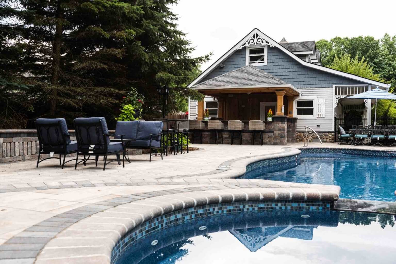 poolside kitchen outdoor luxury space Landscape se michigan Hardscape Clinton twp mi Patio designs Clinton twp mi Michigan Pavers Paver Installation Michigan Paver Contractors in Michigan Best Pavers in Michigan Michigan Patio Pavers Driveway Pavers Michigan Walkway Pavers Michigan pool and spa design Metro Detroit Metro Detroit pool and spa experts Custom pool design Metro Detroit Spa installation in Metro Detroit
