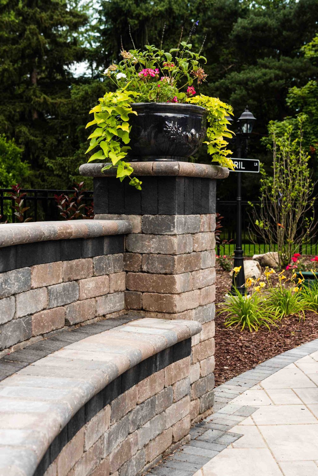 detail of poolside bench Landscape se michigan Hardscape Clinton twp mi Patio designs Clinton twp mi Natural Stone Pavers Michigan Michigan Paver Patio Ideas