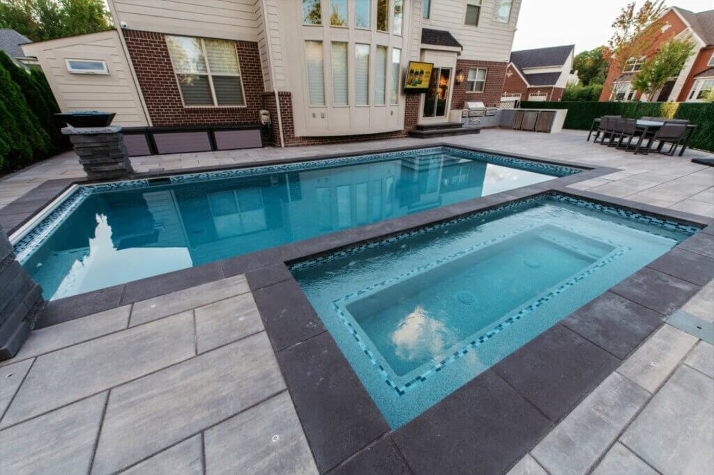 It's Lit - Troy, MI gunite pool & wide spa Troy, MI Outdoor living space with custom pool and spa Custom inground pools Backyard pool ideas detroit Outdoor living contractor oak Gunite Pool Construction Custom Gunite Pool Designs Gunite Pool Installation Gunite Pool vs. Vinyl Pool Gunite Pool Benefits Gunite Pool Cost Michigan Landscape Design Landscape Design Services in Michigan Professional Landscape Design Michigan Michigan Landscape Architects Best Landscape Designers in Michigan Michigan Residential Landscape Design Custom Landscape Design Michigan Michigan Garden Design Landscape Planning Michigan pool and spa design Metro Detroit Metro Detroit pool and spa experts Custom pool design Metro Detroit Spa installation in Metro Detroit Metro Detroit outdoor spa design Residential pool design Metro Detroit Metro Detroit luxury pool and spa Pool and spa renovation Metro Detroit Metro Detroit backyard pool design Metro Detroit pool and spa builders