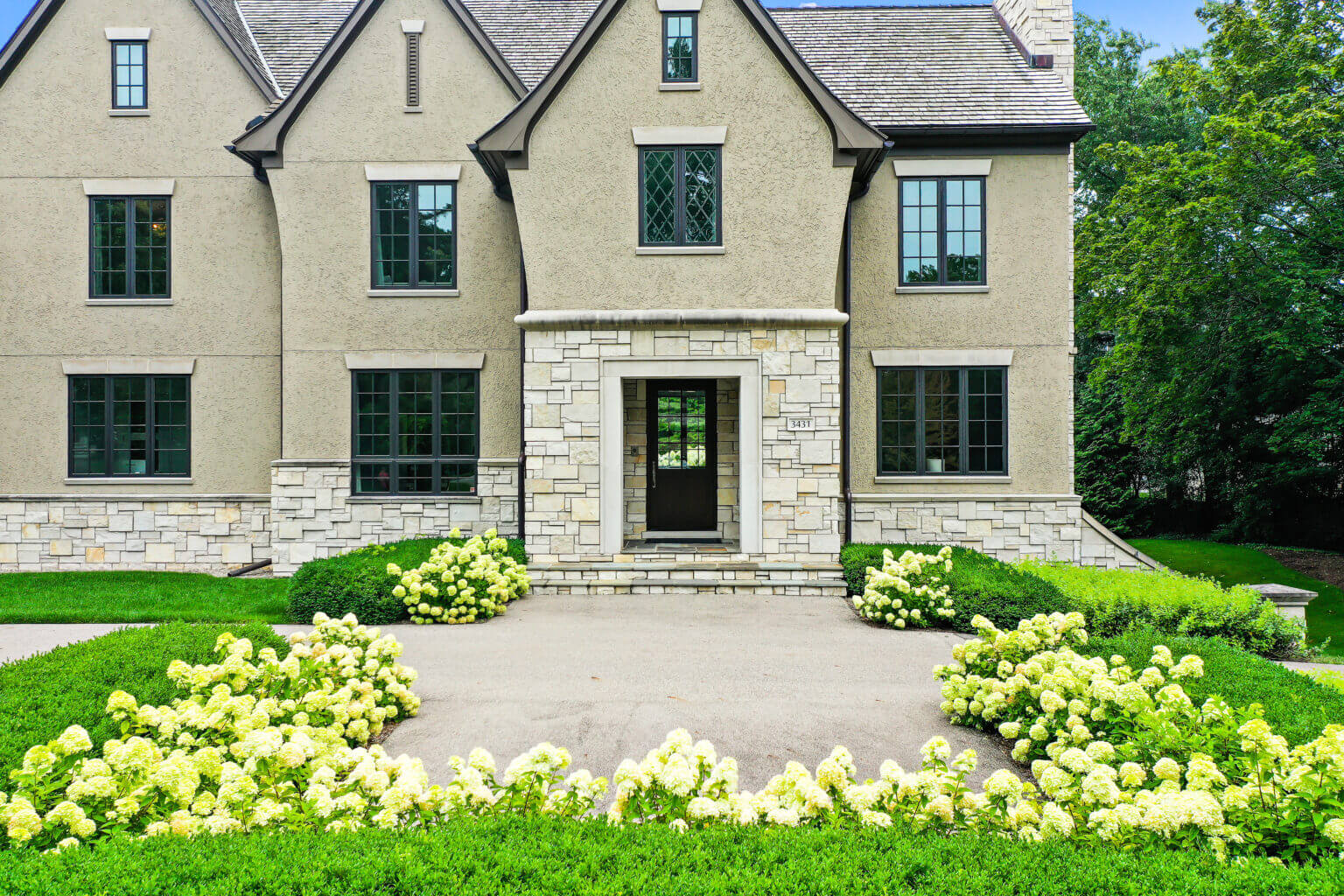 front yard landscaping, landscape design, michigan pool design, paving company in Michigan, pavers, pavers near me, landscaping ideas, garden ideas, outdoor plants, front yard ideas, landscaping ideas for front of house, unilock brick paving in Bloomfield