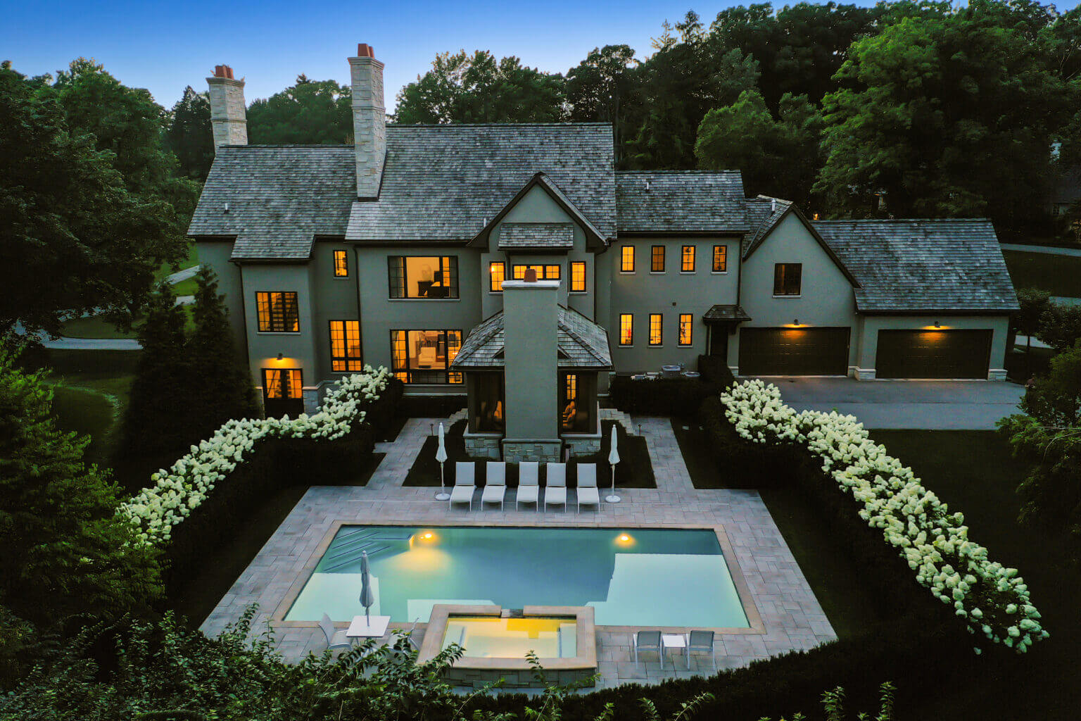 landscape design, michigan pool design, paving company in Michigan, inground pool, pool inspo, backyard pool, pavers, pavers near me, swim and spa, swimming pool design and install, backyard ideas, privacy fence ideas, backyard landscaping ideas, inground pool ideas, gunite pools, pool lights, led pool lights, hydrangeas, unilock