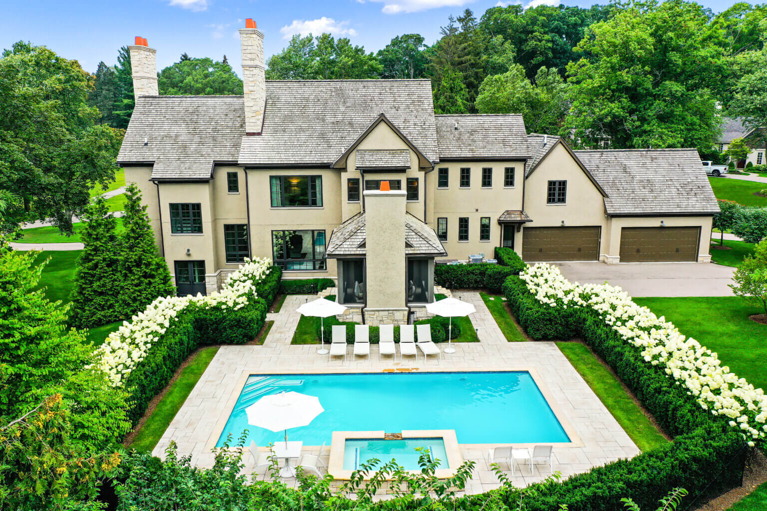 landscape design, michigan pool design, paving company in Michigan, inground pool, pool inspo, backyard pool, pavers, pavers near me, swim and spa, swimming pool design and install, backyard ideas, privacy fence ideas, backyard landscaping ideas, unilock brick paving in Bloomfield