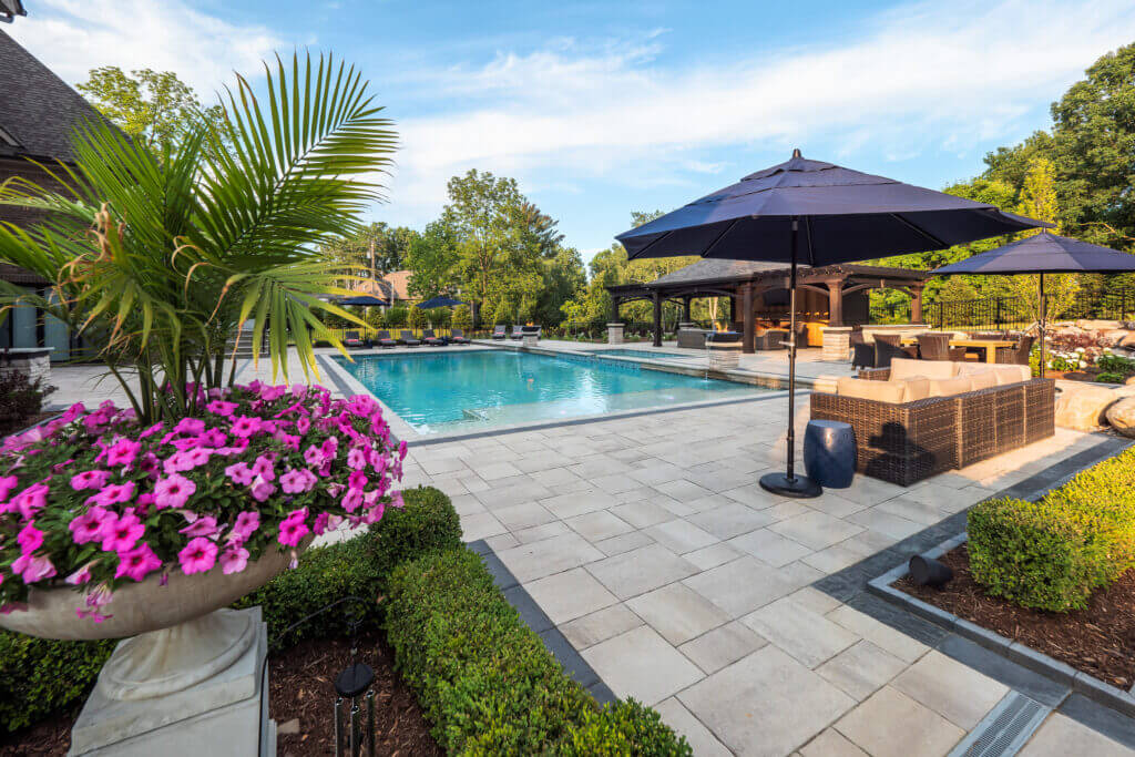 hedges, gunite pools, patio pavers, concrete paving, inground pools, pool and spa, fire bowls, patio covers in michigan, patio ideas, pool inspo, gazebos in michigan, cabanas in Michigan, backyard design, backyard landscape design, fire bowls, pool fountains, concrete builders, unilock, outdoor fireplaces in michigan, jacuzzi, outdoor hot tubs, pergola, gazebo, backyard ideas, patio design near me, fire glass, backyard ideas, landscape architecture, landscaping services, outdoor design inspo, cabana, fire pit, fire pits near me, brick paving, patio stones, patio steps, unilock pavers pool designers near me professional pool design & installation