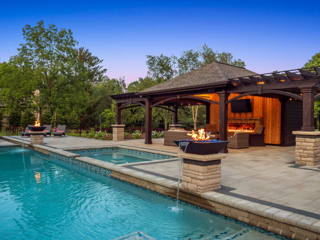 hedges, gunite pools, patio pavers, concrete paving, inground pools, pool and spa, fire bowls, patio covers in michigan, patio ideas, pool inspo, gazebos in michigan, cabanas in Michigan, backyard design, backyard landscape design, fire bowls, pool fountains, concrete builders, unilock, outdoor fireplaces in michigan, jacuzzi, outdoor hot tubs, pergola, gazebo, backyard ideas, patio design near me, fire glass, backyard ideas, landscape architecture, landscaping services, outdoor design inspo, cabana, fire pit, fire pits near me, brick paving, patio stones, patio steps, unilock pavers