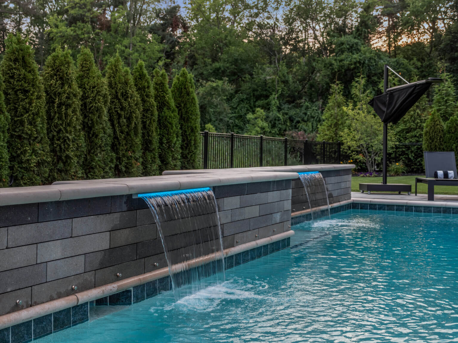 cascading pool fountain Paver pool deck pool and spa design Metro Detroit Metro Detroit pool and spa experts Custom pool design Metro Detroit Spa installation in Metro Detroit Metro Detroit outdoor spa design Residential pool design Metro Detroit Metro Detroit luxury pool and spa Pool and spa renovation Metro Detroit Metro Detroit backyard pool design Metro Detroit pool and spa builders Metro Detroit pool and spa contractors Affordable pool and spa design Metro Detroit Metro Detroit pool and spa remodeling Metro Detroit pool and spa consultation Metro Detroit spa and hot tub design Metro Detroit indoor pool design inground pool  custom gunite pool backyard living w/ inground pool luxury pool designer luxury custom pool builder  luxury gunite pool 