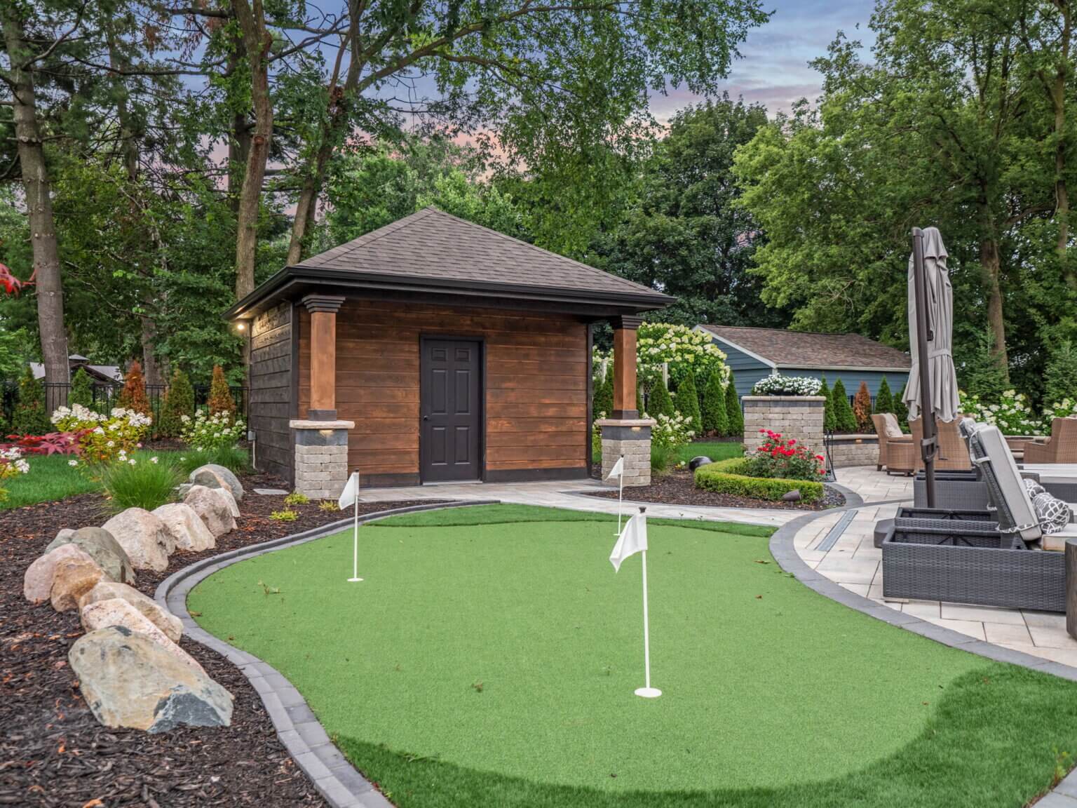 backyard putt-putt area Michigan Landscape Design Landscape Design Services in Michigan Professional Landscape Design Michigan Michigan Landscape Architects Best Landscape Designers in Michigan Michigan Residential Landscape Design custom backyard bathhouse Michigan custom backyard bathhouse Macomb Michigan