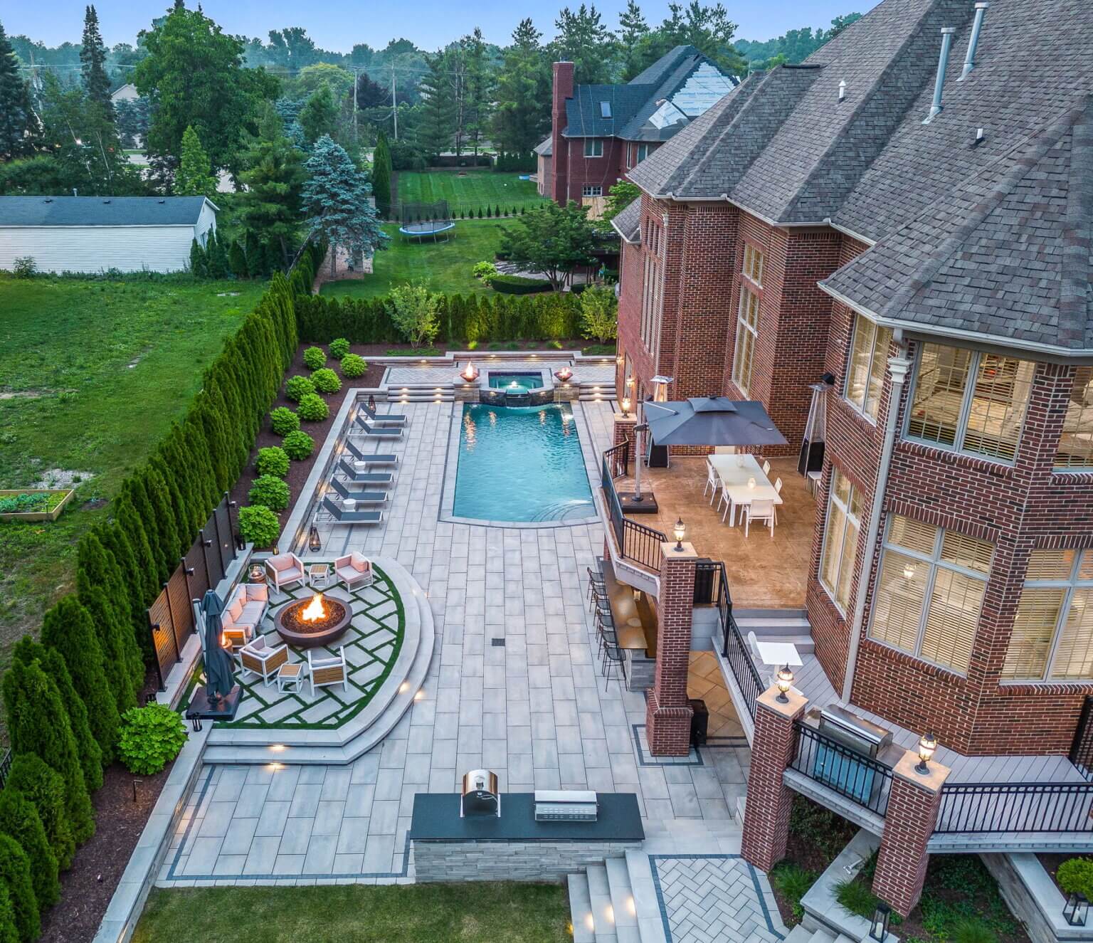 swimming pool builders shelby twp mi shelby township pool builders custom inground pools Macomb county natural stone pool deck inground pool contractor freeform gunite pool builders freeform fiberglass pool spillover spa gunite pool builders gunite inground pool builders michigan gunite inground pool builders detroit gunite pool design michigan inground pool installers michigan pool installers michigan pool & raised spa freeform pool and spa inground pool custom gunite pool backyard living w/ inground pool luxury pool designer luxury custom pool builder  luxury gunite pool  gunite pool & wide spa