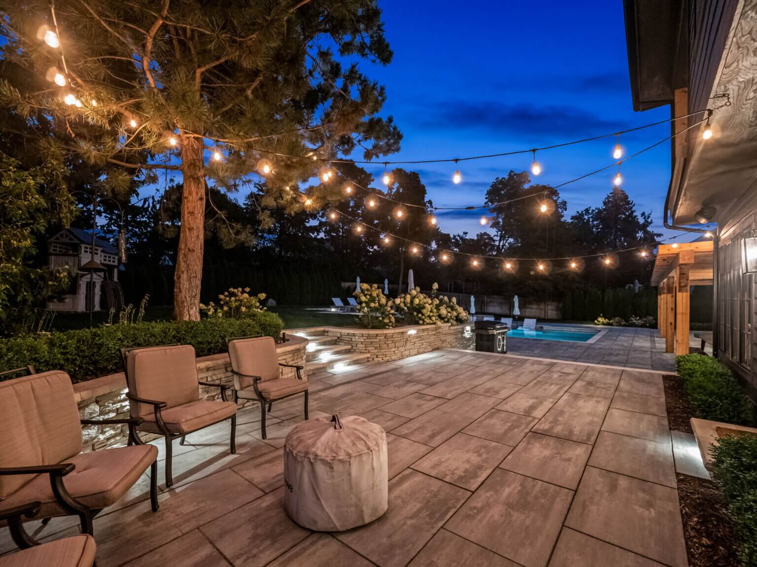 michigan backyard ideas landscape lighting string light ideas patio paver company patio pool deck brick pavers brick paving