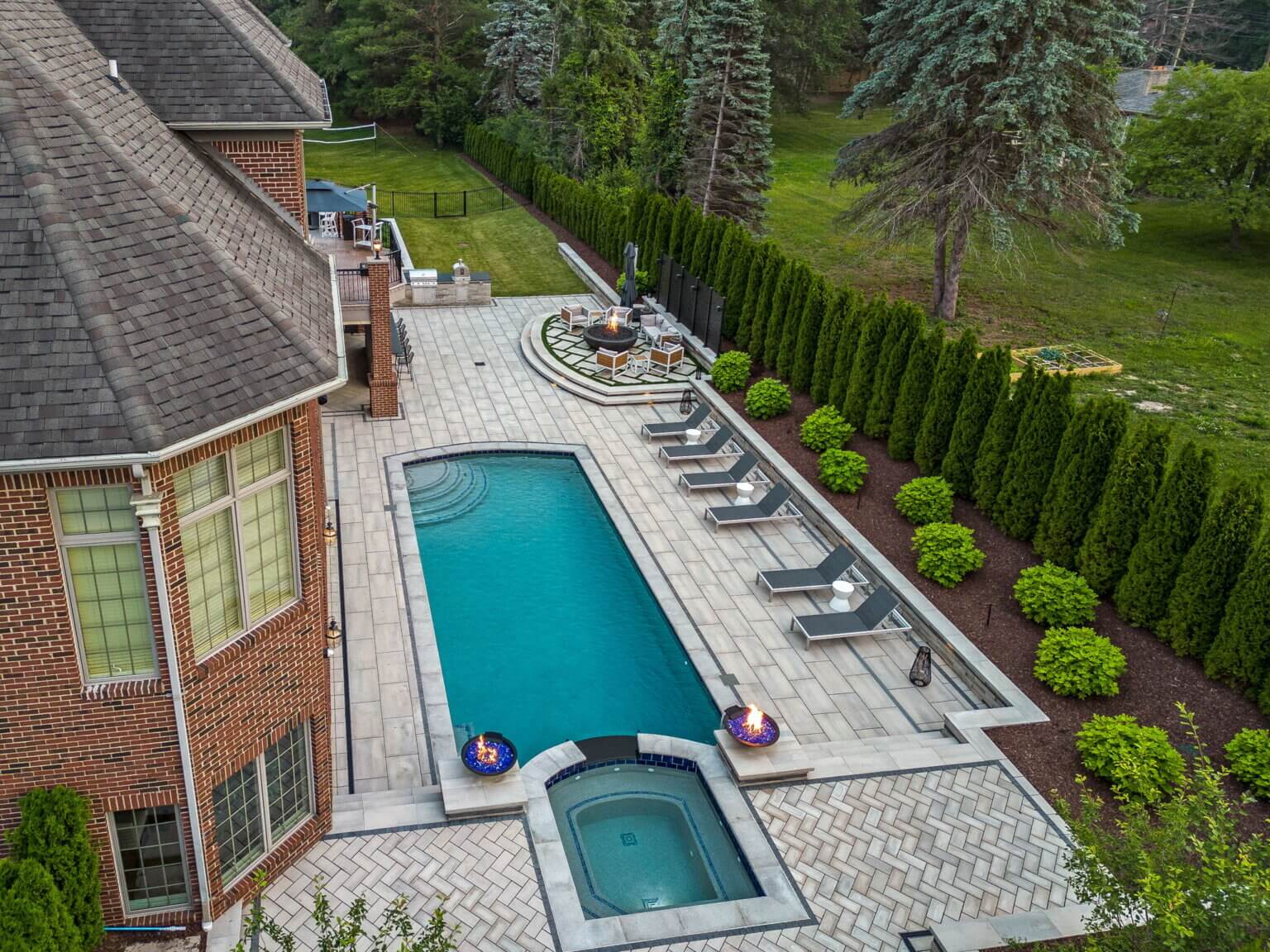 swimming pool builders shelby twp mi shelby township pool builders custom inground pools Macomb county natural stone pool deck inground pool contractor freeform gunite pool builders freeform fiberglass pool spillover spa gunite pool builders gunite inground pool builders michigan gunite inground pool builders detroit gunite pool design michigan inground pool installers michigan pool installers michigan pool & raised spa freeform pool and spa inground pool custom gunite pool backyard living w/ inground pool luxury pool designer luxury custom pool builder  luxury gunite pool  gunite pool & wide spa