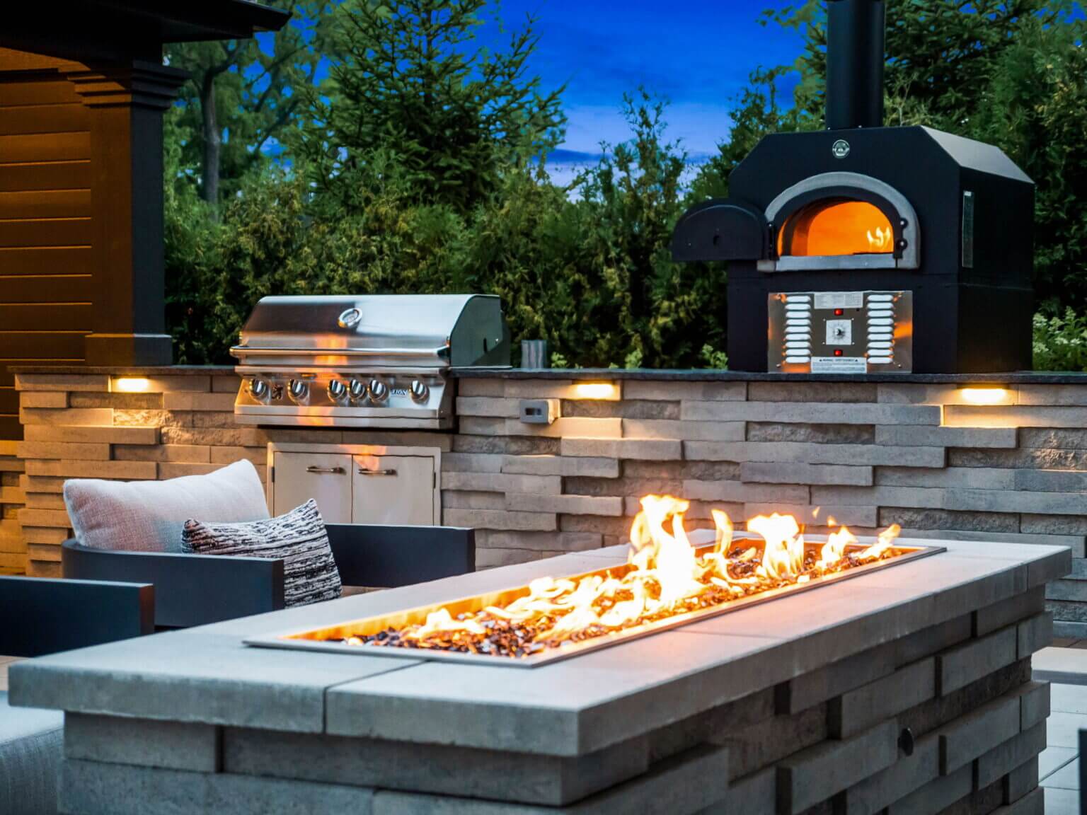 Outdoor Fire Features Fire Pit Designs Fire Feature Ideas Gas Fire Pits Outdoor Fireplaces fireplace builder michigan Michigan Pavers Paver Installation Michigan Paver Contractors in Michigan Best Pavers in Michigan Michigan Patio Pavers Driveway Pavers Michigan