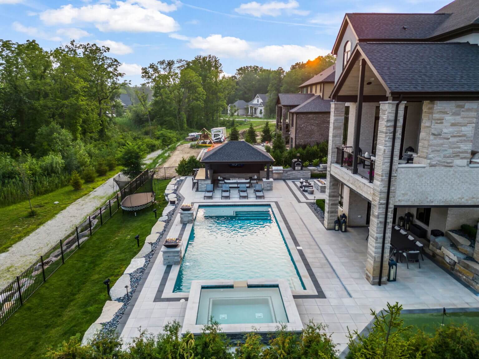 spillover spa spillover spa builders pool and spa design Metro Detroit Metro Detroit pool and spa experts Custom pool design Metro Detroit Spa installation in Metro Detroit Metro Detroit outdoor spa design Residential pool design Metro Detroit Metro Detroit luxury pool and spa Pool and spa renovation Metro Detroit Metro Detroit backyard pool design Metro Detroit pool and spa builders Metro Detroit pool and spa contractors