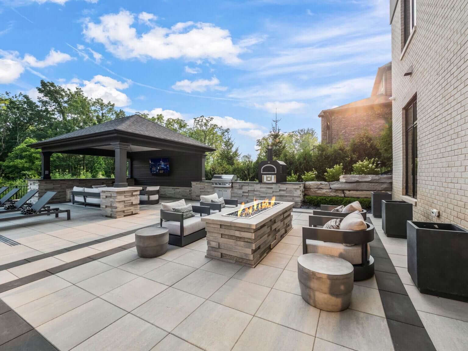 Outdoor Fire Features Fire Pit Designs Fire Feature Ideas Gas Fire Pits Outdoor Fireplaces fireplace builder michigan Michigan Pavers Paver Installation Michigan Paver Contractors in Michigan Best Pavers in Michigan
