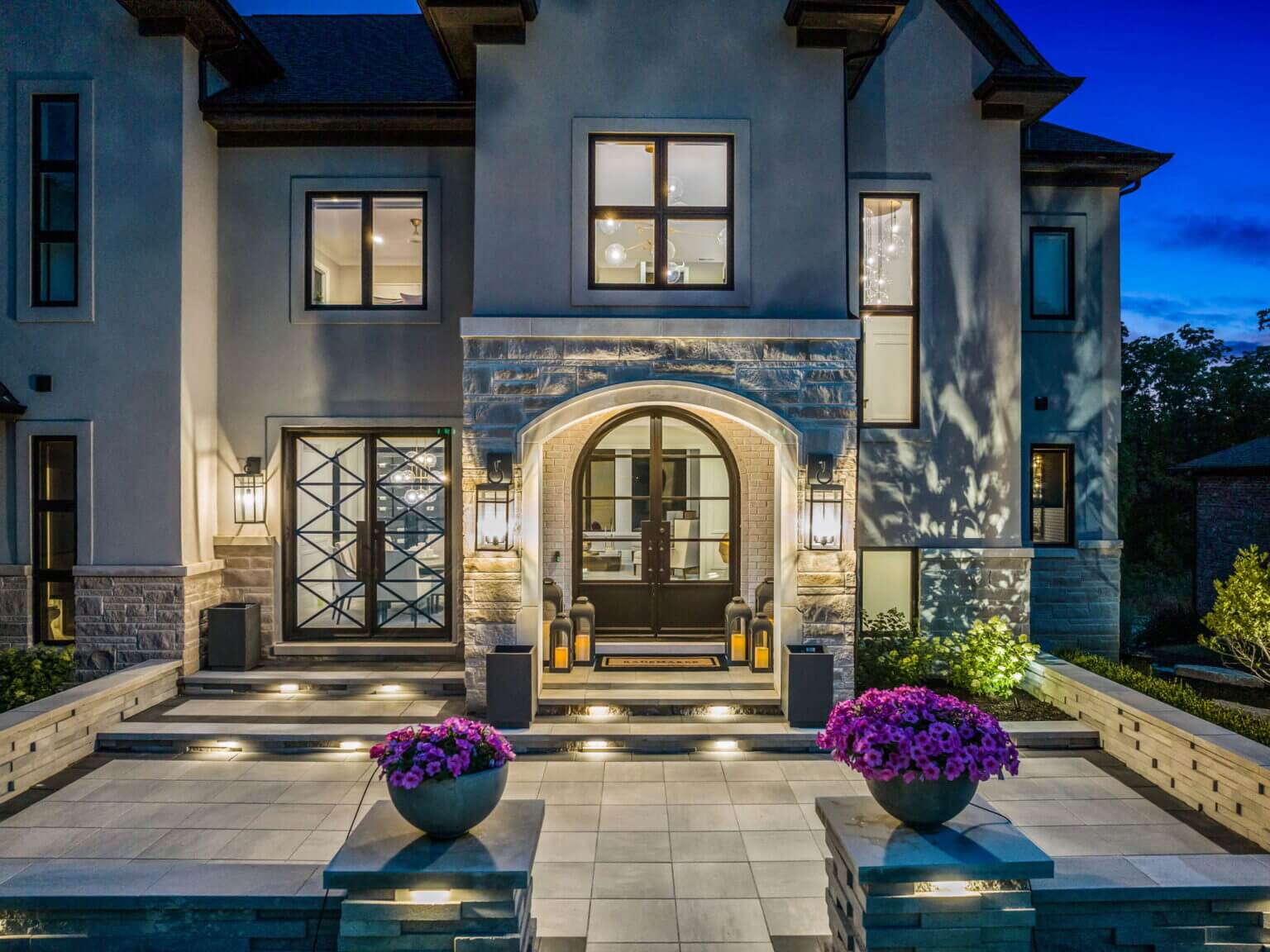 Front yard pavers Michigan Michigan front yard landscaping with pavers Front yard paving stones in Michigan Front yard hardscape design Michigan Michigan front yard patio pavers Front yard walkway pavers