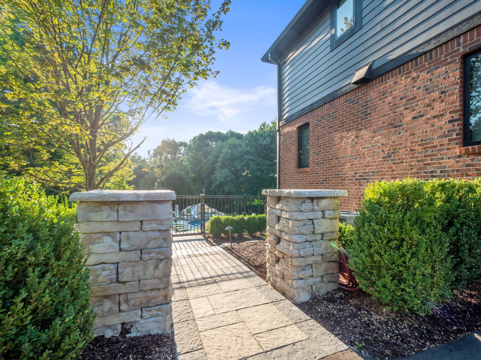 retaining wall landscaping rock near me green landscaping hard landscaping curb appeal landscaping tlc lawn care building raised garden beds patio pavers near me landscape management Front yard pavers Michigan Michigan front yard landscaping with pavers Front yard paving stones in Michigan Front yard hardscape design Michigan Michigan front yard patio pavers Front yard walkway pavers Michigan