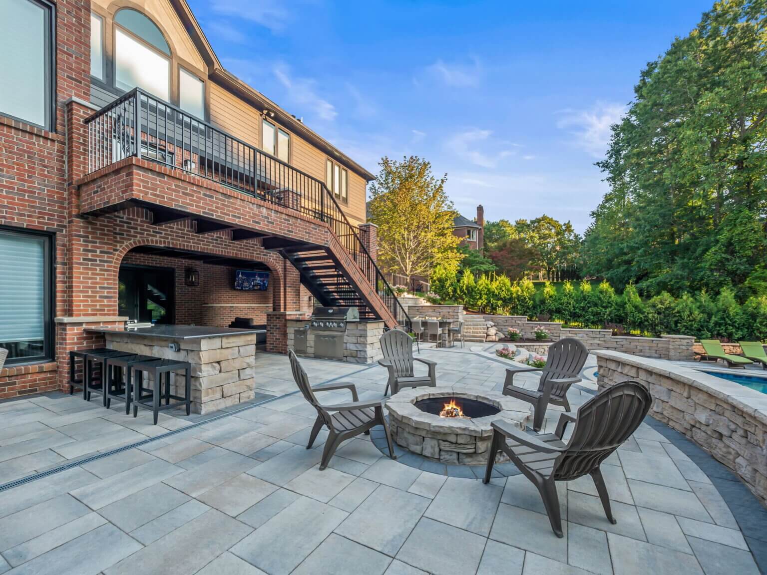 Outdoor fireplace Gas fire pit outdoor kitchen, outdoor bar, outdoor kitchen ideas, patio ideas, patio design ideas, design outdoor kitchens, open kitchen, outdoor cooking, small backyard patio ideas, bbq grill, outdoor grill, bbq grills, built in grill, Antonelli Landscape, Antonelli Landscape pool spa Unilock contractor michigan