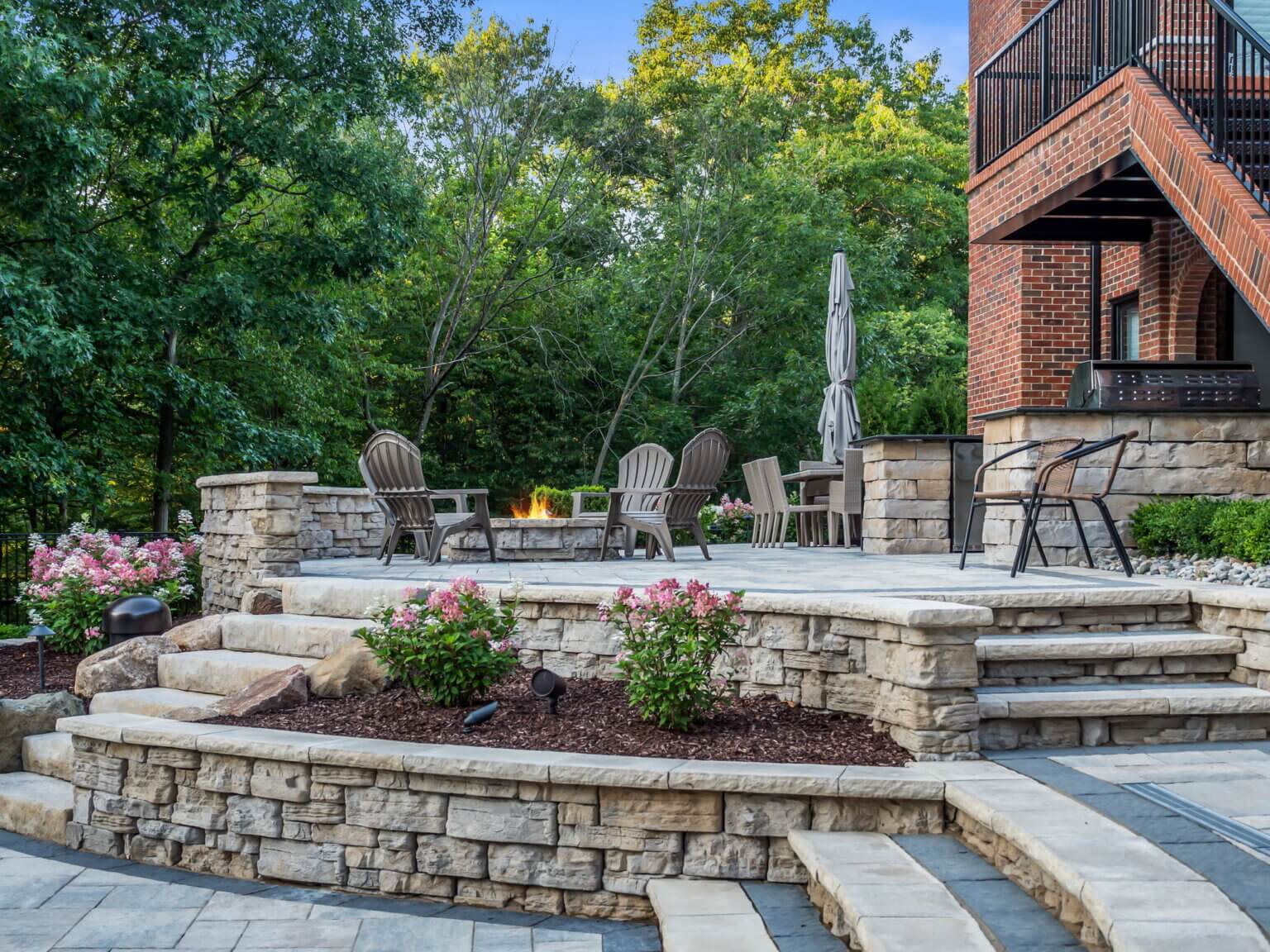retaining wall landscaping rock near me green landscaping hard landscaping curb appeal landscaping tlc lawn care building raised garden beds patio pavers near me landscape management outdoor living Oakland county outdoor kitchen outdoor bar