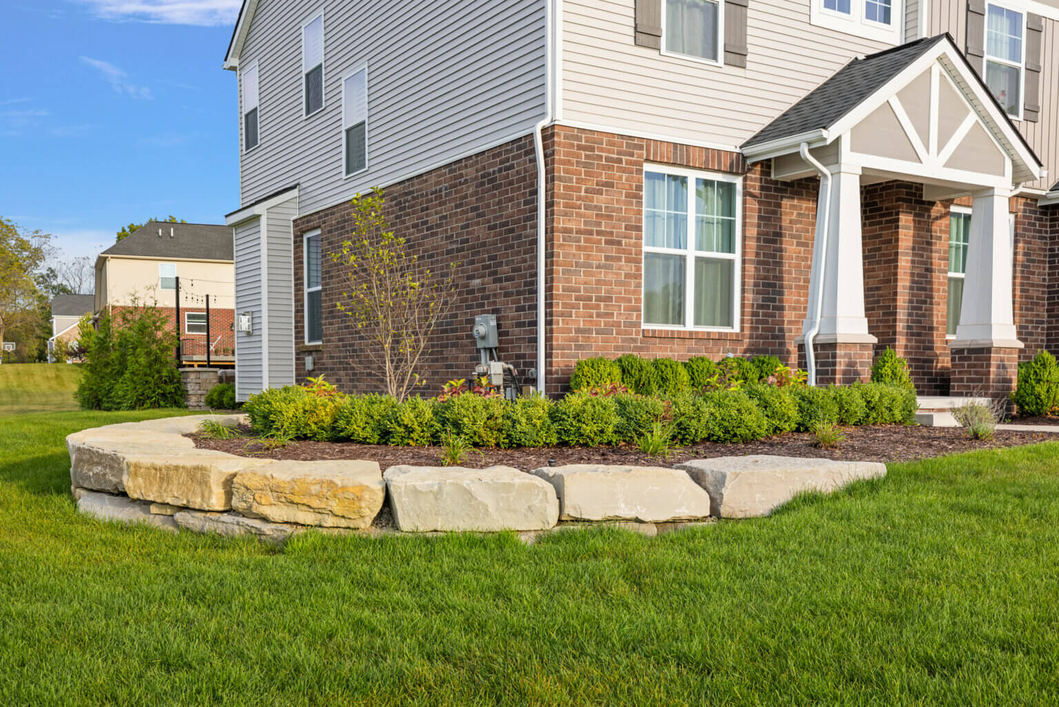 Front yard pavers Michigan Michigan front yard landscaping with pavers Front yard paving stones in Michigan Front yard hardscape design Michigan Michigan front yard patio pavers Front yard walkway pavers Michigan Front yard paver installation in Michigan Michigan front yard brick pavers