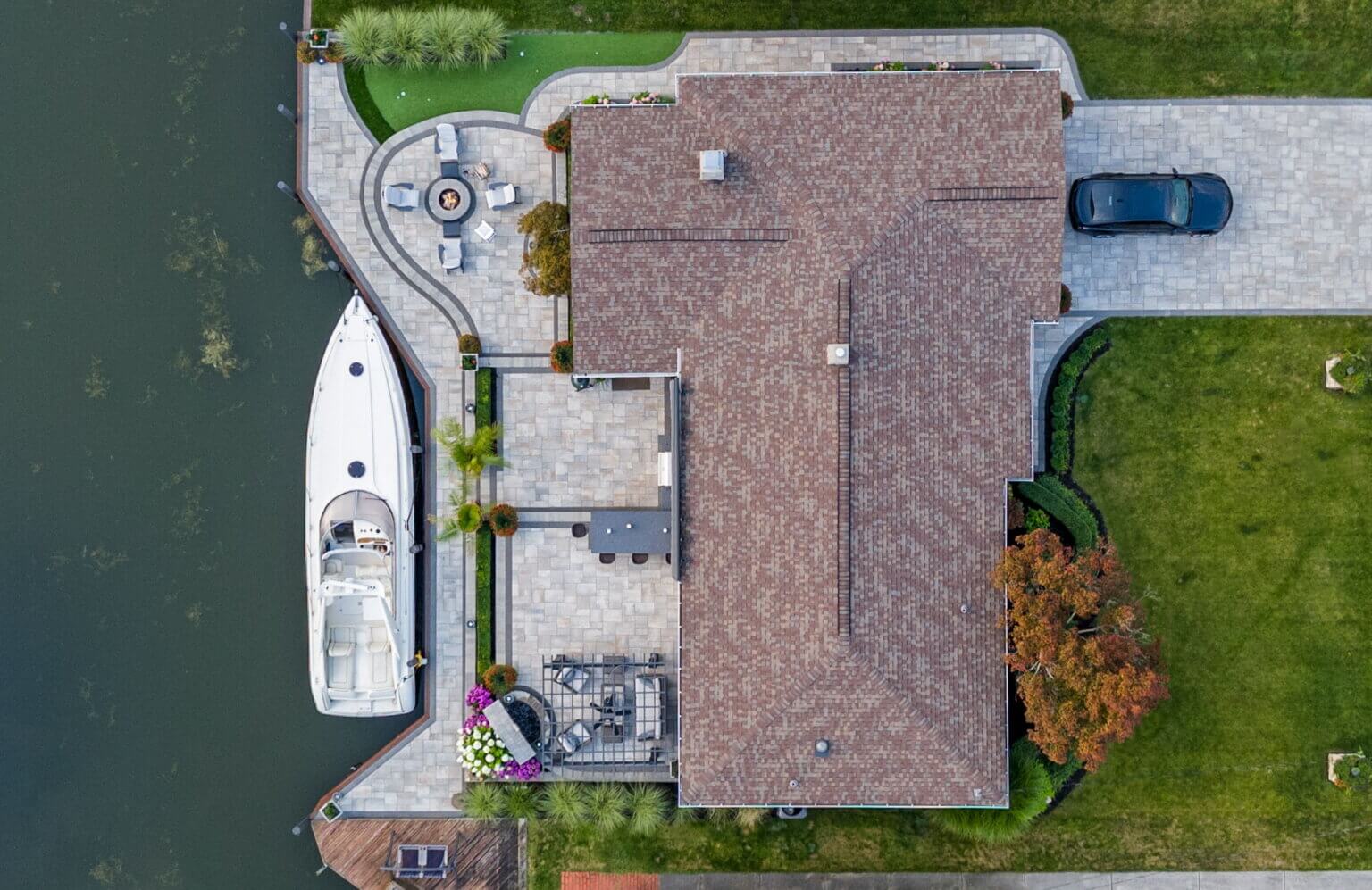 patio pavers in Harrison twp, mi lake life project Antonelli Landscape pool spa