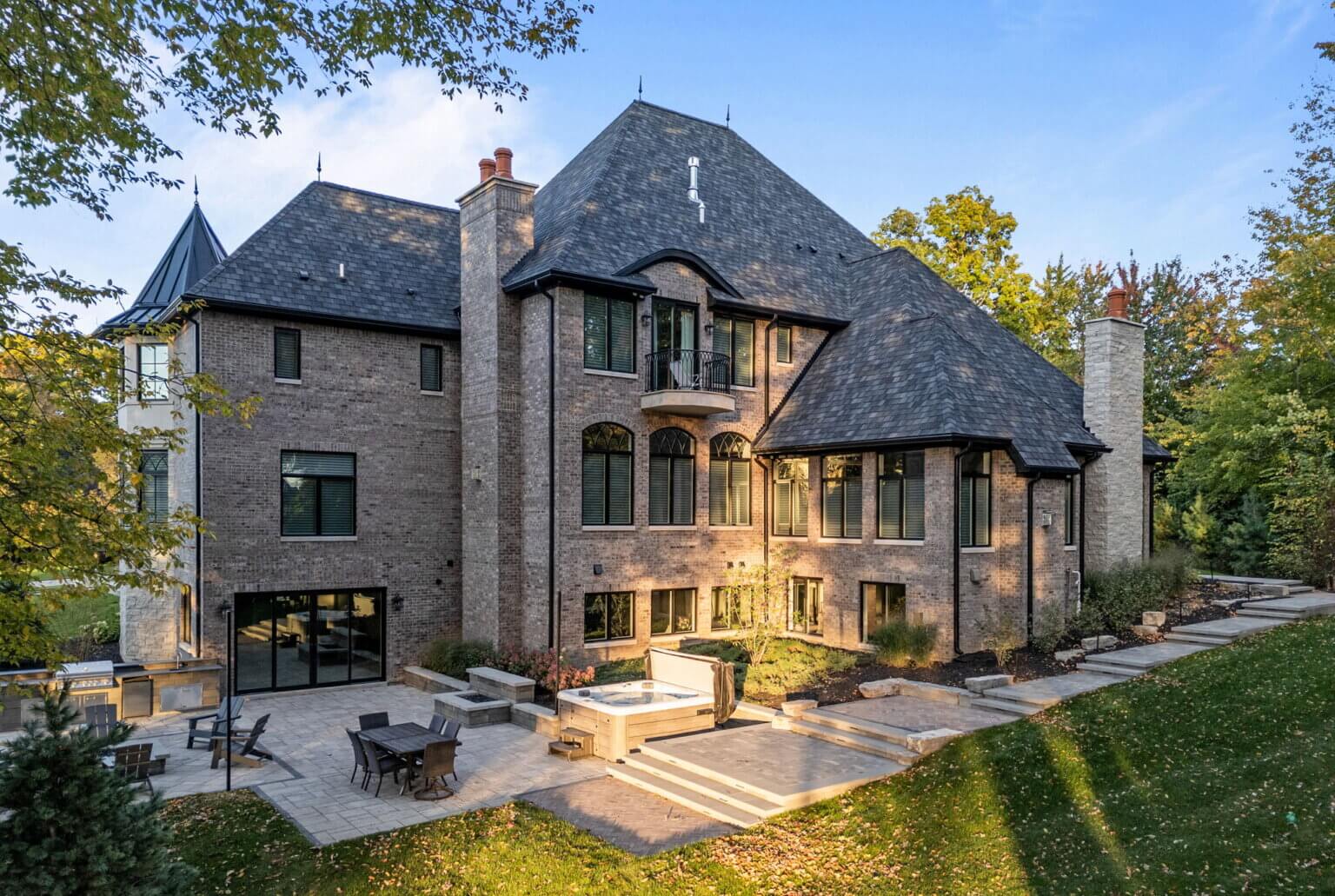 Unilock paving stone Unilock retaining walls Unilock coping  Michigan fieldstone boulders Limestone outcropping 