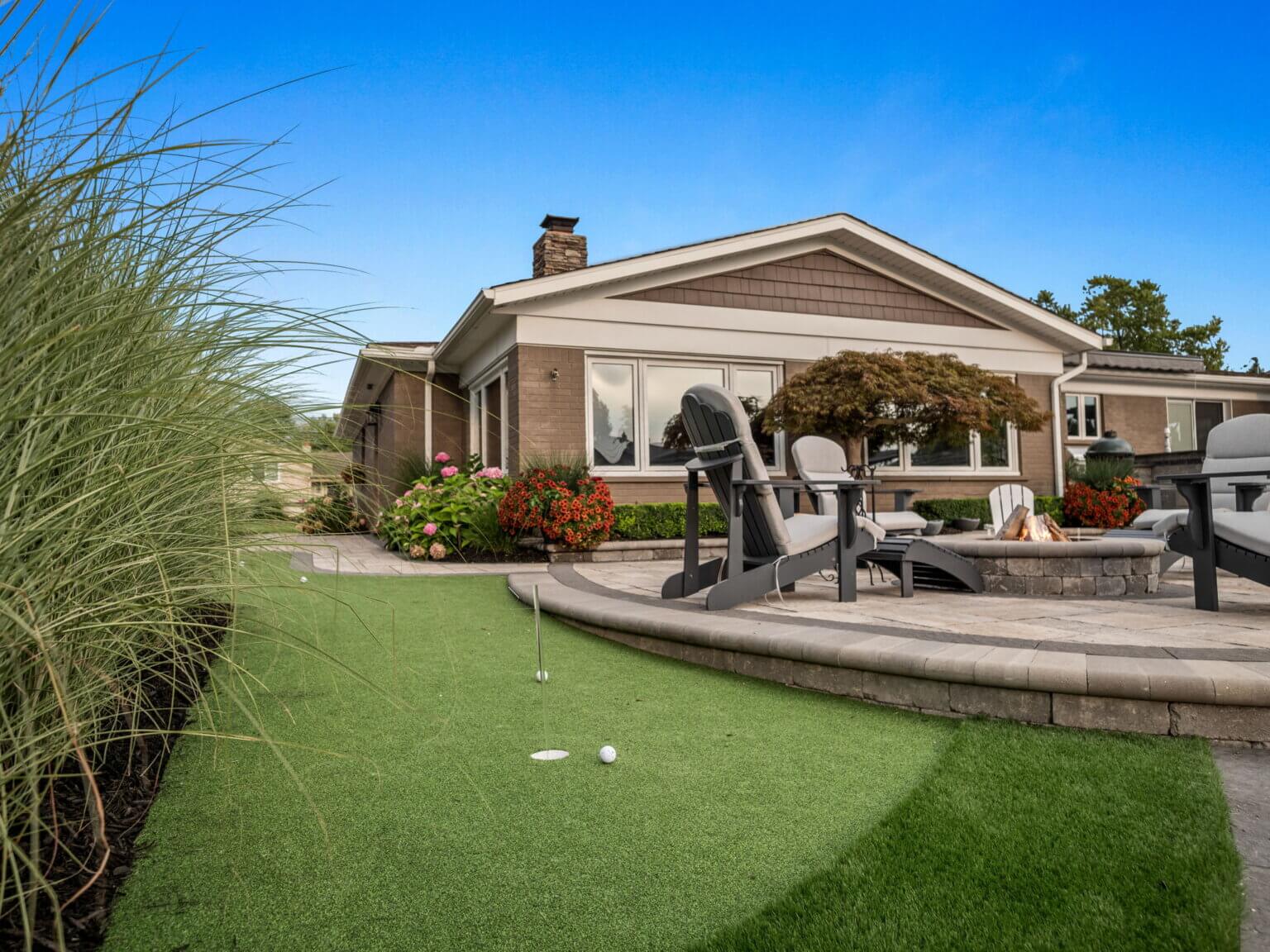 Artificial turf putting green backyard living backyard living spaces luxury living spaces landscaping near me, landscape design, landscaping companies near me, landscaping ideas, landscape architecture, landscape ideas, garden design, landscape design ideas, quality landscaping, landscapes pictures, stone pavers, brick pavers, unilock pavers in michigan, retaining walls, paver patio ideas, brick pavers, stone pavers in michigan, patio blocks, garden pavers michigan