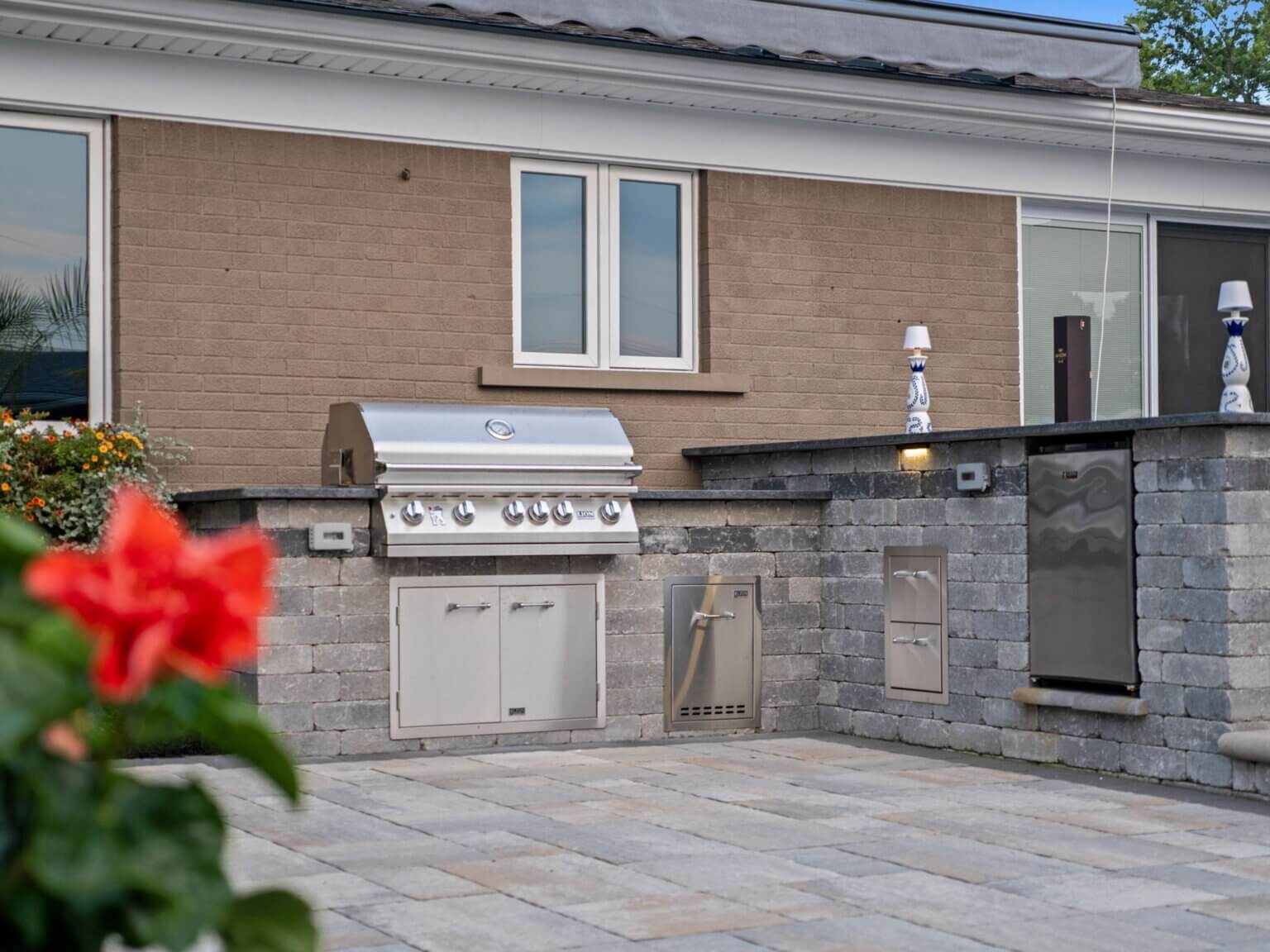 patio pavers in Harrison twp, mi outdoor kitchen, outdoor bar, outdoor kitchen ideas, patio ideas, patio design ideas, design outdoor kitchens, open kitchen, outdoor cooking, small backyard patio ideas, bbq grill, outdoor grill, bbq grills, built in grill, Antonelli Landscape, Antonelli Landscape pool spa, outdoor grilling station stone pavers, brick pavers, unilock pavers in michigan, retaining walls, paver patio ideas, brick pavers, stone pavers in michigan